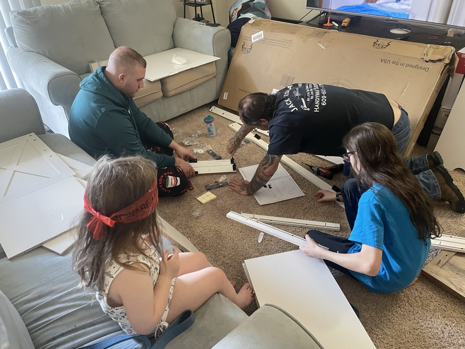 The family building furniture together