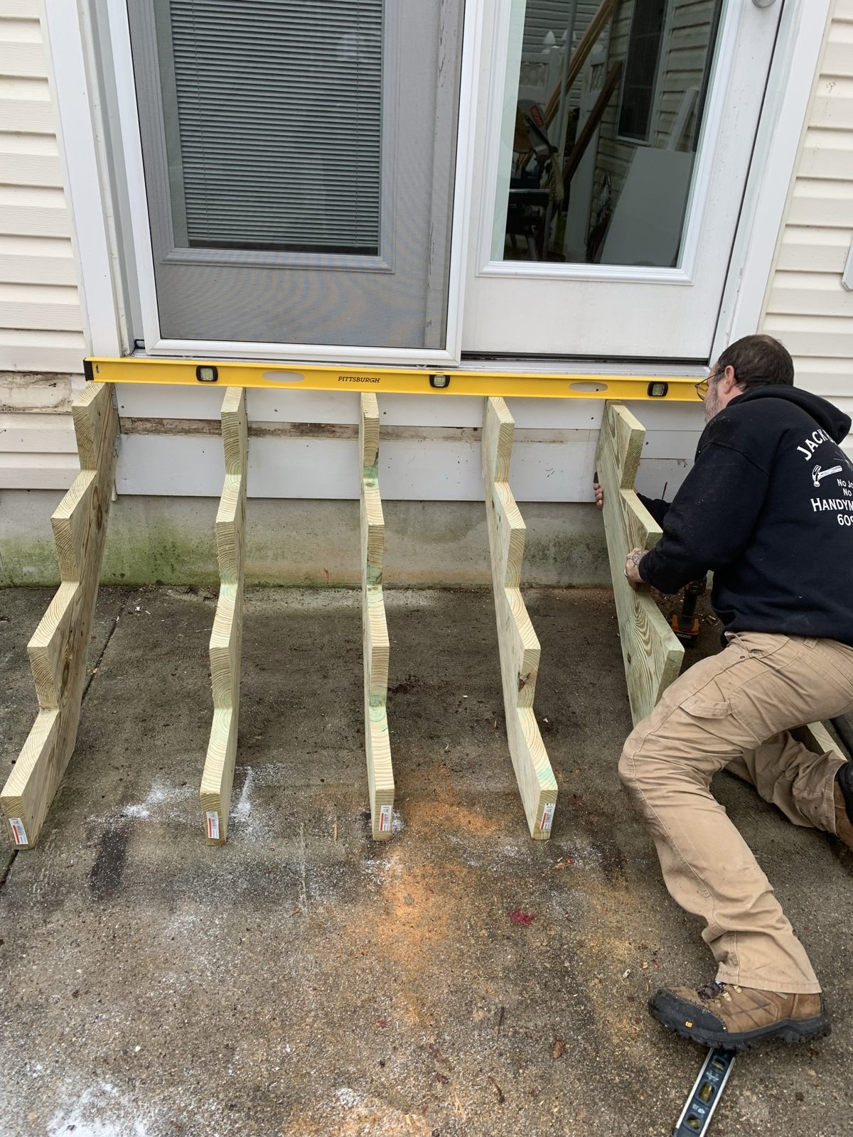 Rear entry door and landing framing